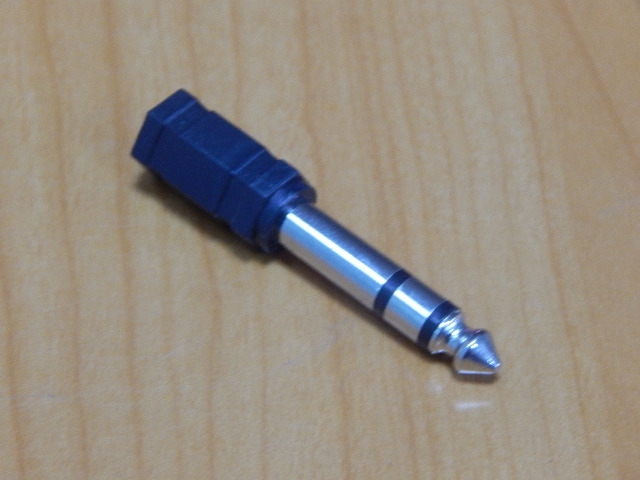 Переходник 6.35mm шт. стерео - 3.5mm гн. стерео пластик  2-121